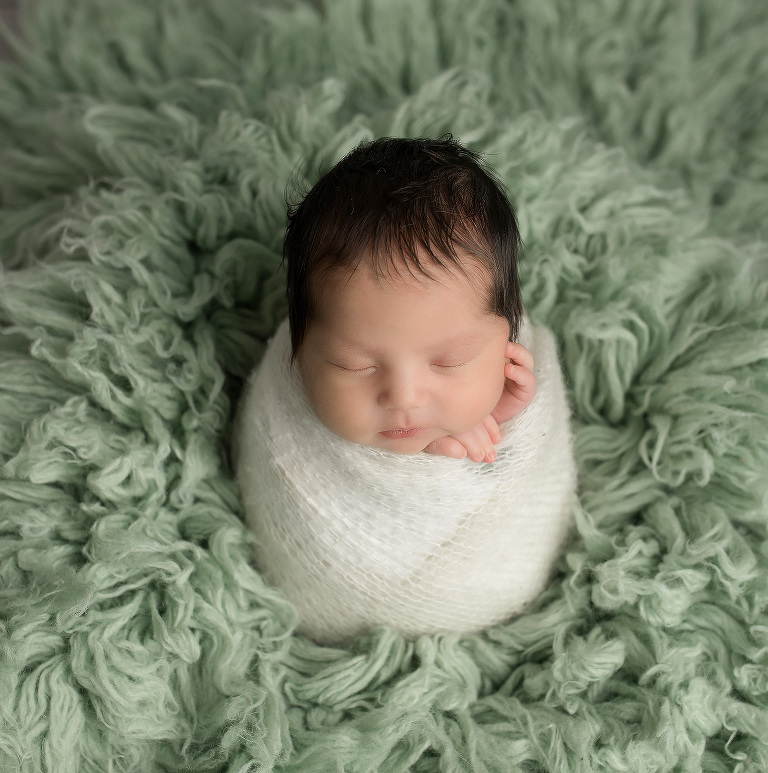 Newborn studio session with Everyn by Jillian Wilhelm Photography in Windsor Ontario in a potatoe sack pose