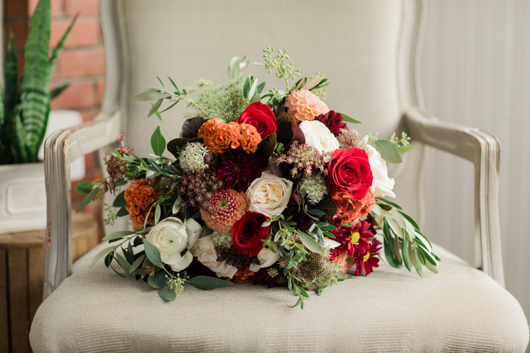 bridal bouquet fall colours on chair